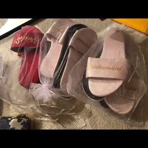 Bridesmaid and brides slippers with bags.